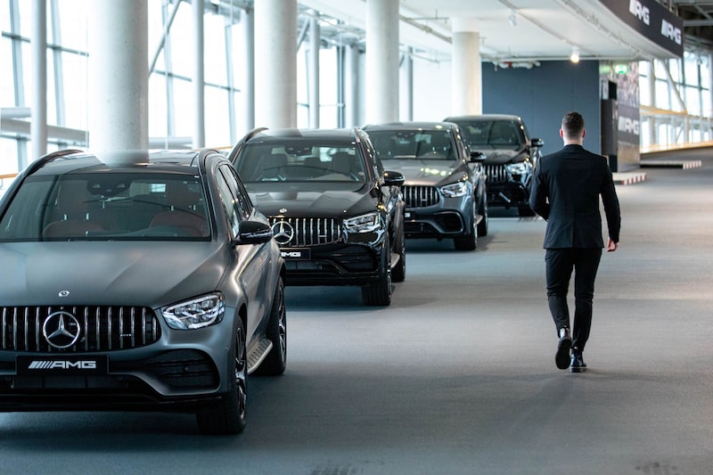 Automobiles on display inside a Mercedes-Benz AG showroom in Berlin, Germany, on Tuesday, Feb. 24, 2022. Automobiles on display inside a Mercedes-Benz AG showroom in Berlin, Germany, on Tuesday, Feb. 24, 2022.