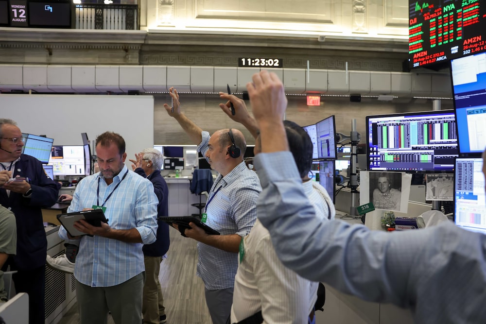 Traders work on the floor of the American Stock Exchange (AMEX) at the New York Stock Exchange (NYSE) in New York, US, on Wednesday, Aug. 12, 2026. US stocks advanced toward all-time highs, led by the technology sector, after a subdued inflation reading helped ease interest-rate hike concerns. Photographer: Michael Nagle/Bloomberg Traders work on the floor of the American Stock Exchange (AMEX) at the New York Stock Exchange (NYSE) in New York, US, on Wednesday, Aug. 12, 2026. US stocks advanced toward all-time highs, led by the technology sector, after a subdued inflation reading helped ease interest-rate hike concerns. Photographer: Michael Nagle/Bloomberg
