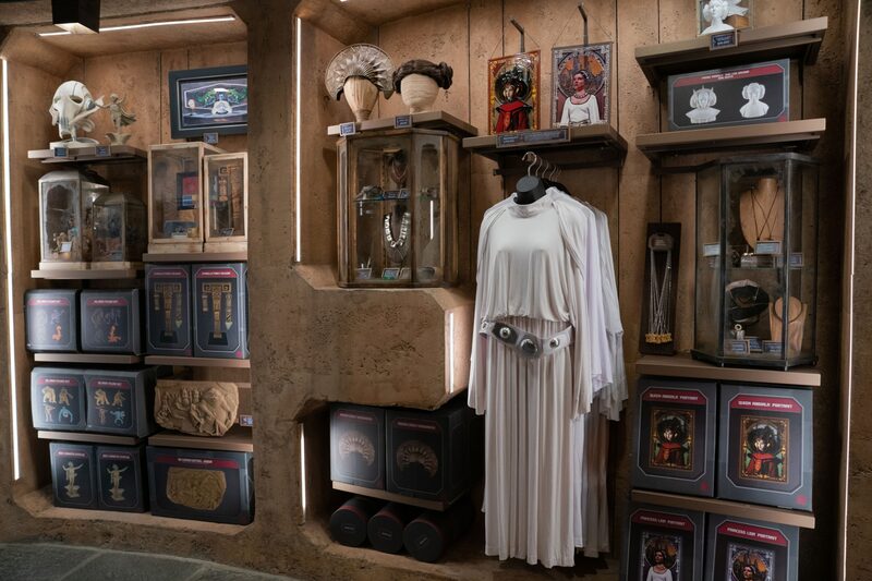 Star Wars merchandise for sale inside a gift shop in the Star Wars: Galaxy's Edge themed area during the reopening of the Disneyland theme park in Anaheim, California, U.S., on Friday, April 30, 2021. Walt Disney Co.s original Disneyland resort in California is sold out for weekends through May, an indication of pent-up demand for leisure activities as the pandemic eases in the nations most-populous state. Photographer: Bing Guan/Bloomberg Star Wars merchandise for sale inside a gift shop in the Star Wars: Galaxy's Edge themed area during the reopening of the Disneyland theme park in Anaheim, California, U.S., on Friday, April 30, 2021. Walt Disney Co.s original Disneyland resort in California is sold out for weekends through May, an indication of pent-up demand for leisure activities as the pandemic eases in the nations most-populous state. Photographer: Bing Guan/Bloomberg