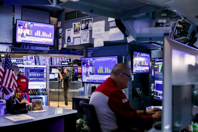 A television station broadcasts average hourly earnings as traders work on the floor of the New York Stock Exchange (NYSE) in New York, US, on Friday, June 5, 2026. Wall Streets historic weekly run is poised to come to a halt, with stocks and bonds falling after a solid jobs report added to speculation the Federal Reserves next interest-rate move will be a hike. Photographer: Michael Nagle/Bloomberg A television station broadcasts average hourly earnings as traders work on the floor of the New York Stock Exchange (NYSE) in New York, US, on Friday, June 5, 2026. Wall Streets historic weekly run is poised to come to a halt, with stocks and bonds falling after a solid jobs report added to speculation the Federal Reserves next interest-rate move will be a hike. Photographer: Michael Nagle/Bloomberg