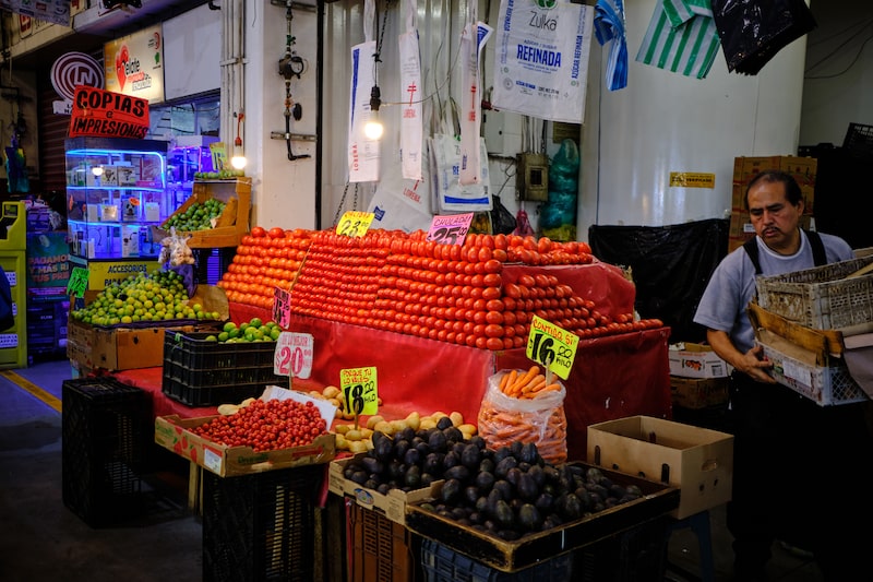 Tomatoes displayed for sale at the retail area of the Central de Abastos market in Mexico City, Mexico, on Saturday, July 12, 2025. The US Commerce Department announced in April it was terminating a long-running agreement with the country's southern neighbor over tomato prices on July 14, which will unleash a 17% levy on the fruits imported from Mexico. Photographer: Mauricio Palos/Bloomberg Tomatoes displayed for sale at the retail area of the Central de Abastos market in Mexico City, Mexico, on Saturday, July 12, 2025. The US Commerce Department announced in April it was terminating a long-running agreement with the country's southern neighbor over tomato prices on July 14, which will unleash a 17% levy on the fruits imported from Mexico. Photographer: Mauricio Palos/Bloomberg