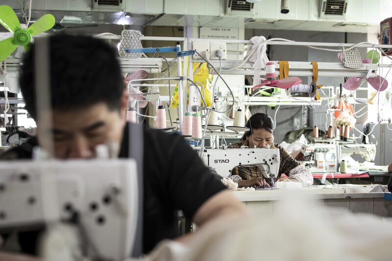 Workers at a garment factory in Guangzhou, China. Photographer: Qilai Shen/Bloomberg Workers at a garment factory in Guangzhou, China. Photographer: Qilai Shen/Bloomberg