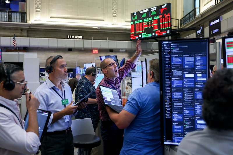 Traders work on the floor of the American Stock Exchange (AMEX) at the New York Stock Exchange (NYSE) in New York, US, on Thursday, July 16, 2026. A selloff in chipmakers dragged down stocks amid concerns over whether massive artificial-intelligence investments will justify lofty valuations, with a resurgence in geopolitical risks also weighing on sentiment. Photographer: Michael Nagle/Bloomberg Traders work on the floor of the American Stock Exchange (AMEX) at the New York Stock Exchange (NYSE) in New York, US, on Thursday, July 16, 2026. A selloff in chipmakers dragged down stocks amid concerns over whether massive artificial-intelligence investments will justify lofty valuations, with a resurgence in geopolitical risks also weighing on sentiment. Photographer: Michael Nagle/Bloomberg
