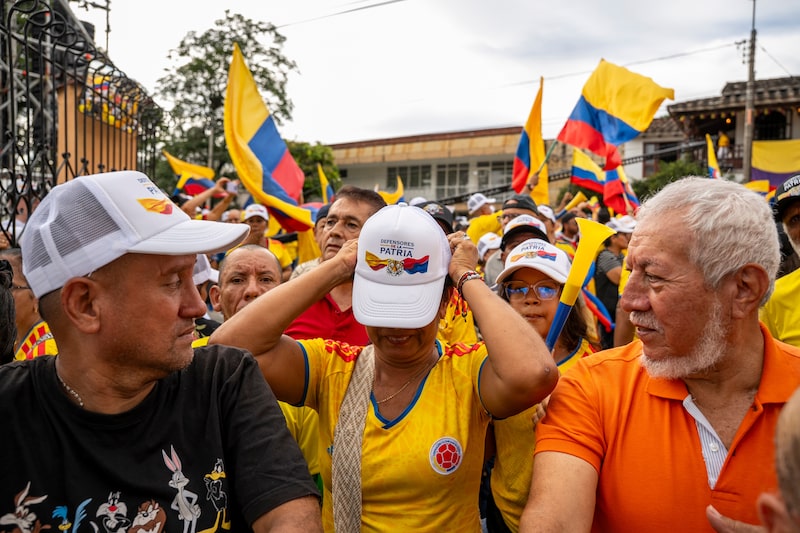 Supporters of Abelardo de la Espriella, presidential candidate for the Defenders of the Homeland party, not pictured, during a closing campaign rally in Buga, Valle del Cauca department, Colombia, on Sunday, June 14, 2026. Conservative lawyer Espriella is leading the left-wing Ivan Cepeda by a margin of 3.9 percentage points with one week to go before Colombia's presidential runoff, according to a poll by the Centro Nacional de Consultoria for the news outlet Cambio. Photographer: Jair F. Coll/Bloomberg Supporters of Abelardo de la Espriella, presidential candidate for the Defenders of the Homeland party, not pictured, during a closing campaign rally in Buga, Valle del Cauca department, Colombia, on Sunday, June 14, 2026. Conservative lawyer Espriella is leading the left-wing Ivan Cepeda by a margin of 3.9 percentage points with one week to go before Colombia's presidential runoff, according to a poll by the Centro Nacional de Consultoria for the news outlet Cambio. Photographer: Jair F. Coll/Bloomberg