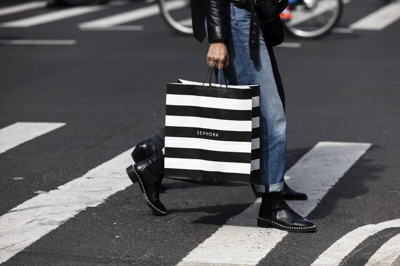 A pedestrian carries a Sephora shopping bag in the SoHo neighborhood of New York, US on Wednesday, March 22, 2023. US retail sales fell in February after a surge in the prior month, suggesting consumer spending, while holding up, is getting challenged by high inflation. A pedestrian carries a Sephora shopping bag in the SoHo neighborhood of New York, US on Wednesday, March 22, 2023. US retail sales fell in February after a surge in the prior month, suggesting consumer spending, while holding up, is getting challenged by high inflation.