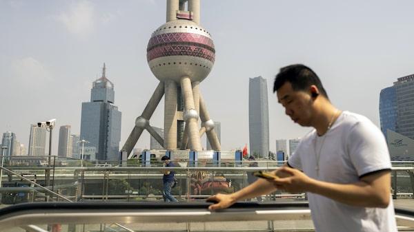 Wall Street recorta pronósticos de crecimiento para China tras cifras desalentadoras Wall Street recorta pronósticos de crecimiento para China tras cifras desalentadoras