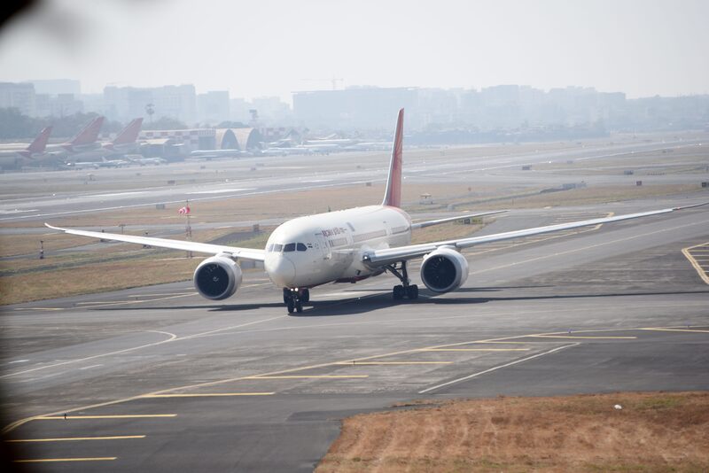 A Boeing 787-8 Dreamliner aircraft of Air India Ltd. at Chhatrapati Shivaji Maharaj International Airport in Mumbai, India, on Wednesday, on Feb. 15, 2023. Air India announced a 470-plane order with Airbus SE and Boeing Co., underscoring the industry’s recovery from the coronavirus pandemic and the airline’s ambition to become a global force after years of contraction. Photographer: Indranil Aditya/Bloomberg A Boeing 787-8 Dreamliner aircraft of Air India Ltd. at Chhatrapati Shivaji Maharaj International Airport in Mumbai, India, on Wednesday, on Feb. 15, 2023. Air India announced a 470-plane order with Airbus SE and Boeing Co., underscoring the industry’s recovery from the coronavirus pandemic and the airline’s ambition to become a global force after years of contraction. Photographer: Indranil Aditya/Bloomberg