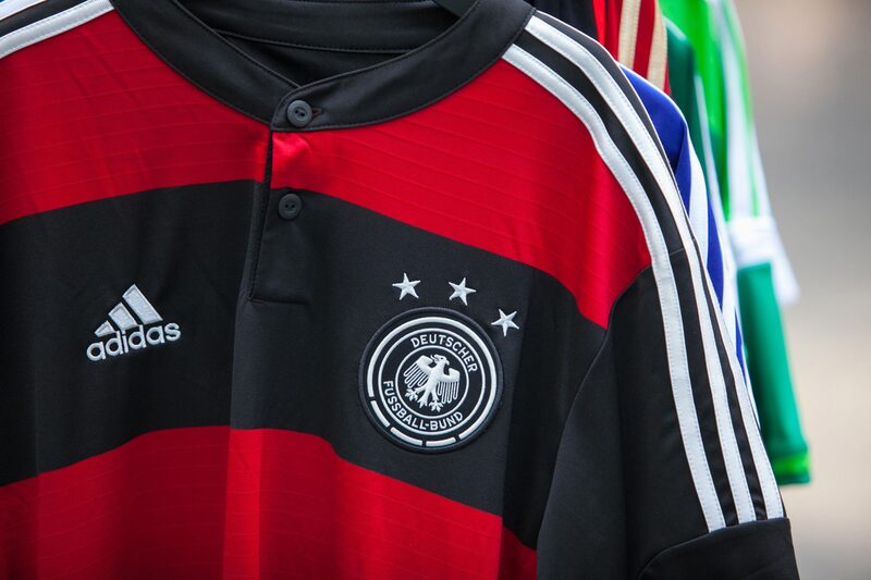 The official soccer shirt of Germany, manufactured by Adidas AG, hangs on display inside the sportswear company's headquarters in Herzogenaurach, Germany, on Thursday, May 15, 2014 The official soccer shirt of Germany, manufactured by Adidas AG, hangs on display inside the sportswear company's headquarters in Herzogenaurach, Germany, on Thursday, May 15, 2014