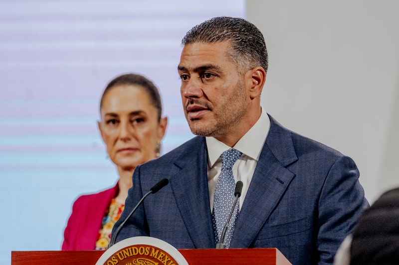 Omar Garcia Harfuch, Mexico's security minister, during a news conference with Claudia Sheinbaum, Mexico's president, left, in Mexico City, Mexico, on Tuesday, Aug. 12, 2025. Garcia Harfuch survived a harrowing cartel hit. Now he's trying to pacify one of the world's most violent nations and the Trump administration. Photographer: Fred Ramos/Bloomberg Omar Garcia Harfuch, Mexico's security minister, during a news conference with Claudia Sheinbaum, Mexico's president, left, in Mexico City, Mexico, on Tuesday, Aug. 12, 2025. Garcia Harfuch survived a harrowing cartel hit. Now he's trying to pacify one of the world's most violent nations and the Trump administration. Photographer: Fred Ramos/Bloomberg