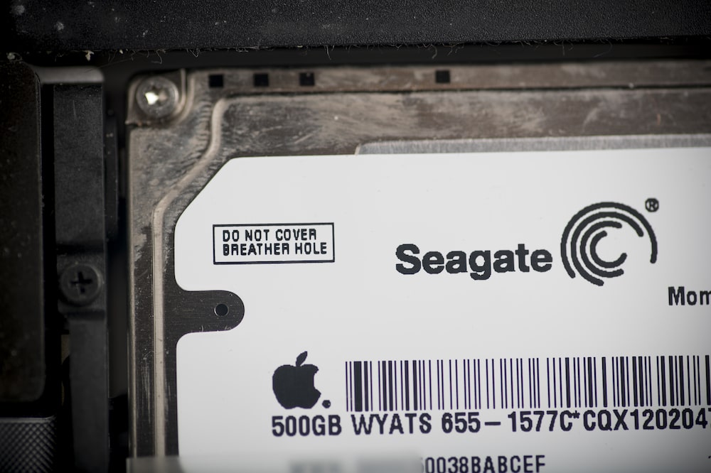 A Seagate Technology Plc Momentus 500GB hard drive is seen inside an Apple Inc. MacBook Pro laptop computer in an arranged photograph in Bangkok, Thailand on Friday, July. 28, 2017. Apple are schedule to announce third-quarter earning figures on Aug. 1. Photographer: Brent Lewin/Bloomberg A Seagate Technology Plc Momentus 500GB hard drive is seen inside an Apple Inc. MacBook Pro laptop computer in an arranged photograph in Bangkok, Thailand on Friday, July. 28, 2017. Apple are schedule to announce third-quarter earning figures on Aug. 1. Photographer: Brent Lewin/Bloomberg