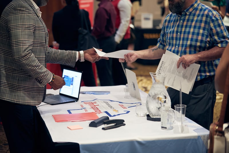 A jobseeker turns in an application during the Catalyst Career Group Dallas Job Fair in Dallas, Texas, US, on Wednesday, July 29, 2026. A jobseeker turns in an application during the Catalyst Career Group Dallas Job Fair in Dallas, Texas, US, on Wednesday, July 29, 2026.