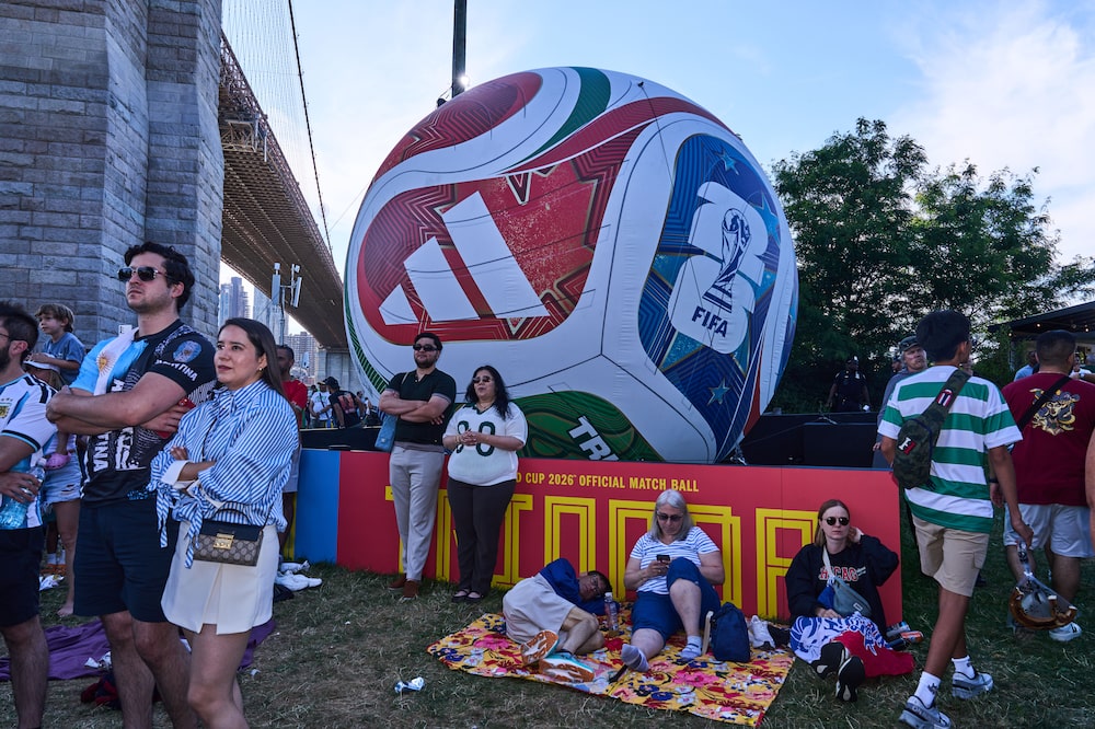 Fans gather to watch the FIFA World Cup 2026 match between France and Senegal during a watch party hosted by Adidas at Brooklyn Bridge Park in the Brooklyn borough of New York, US, on Tuesday, June 16, 2026. The World Cup is back in the US for the first time since 1994 in its biggest version yet, encompassing 48 teams and 104 matches that are also being played in neighboring Canada and Mexico. Photographer: Bing Guan/Bloomberg Fans gather to watch the FIFA World Cup 2026 match between France and Senegal during a watch party hosted by Adidas at Brooklyn Bridge Park in the Brooklyn borough of New York, US, on Tuesday, June 16, 2026. The World Cup is back in the US for the first time since 1994 in its biggest version yet, encompassing 48 teams and 104 matches that are also being played in neighboring Canada and Mexico. Photographer: Bing Guan/Bloomberg