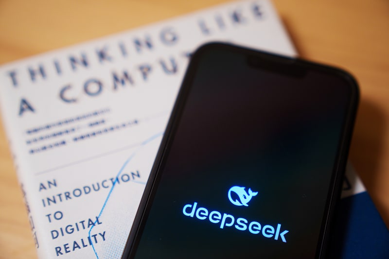 The DeepSeek logo arranged on a smartphone in Hong Kong, China, on Monday, Jan. 27, 2025. Chinese startup DeepSeek's eponymous AI assistant rocketed to the top of Apple Inc.'s iPhone download charts, stirring doubts in Silicon Valley about the strength of America's lead in AI. Photographer: Lam Yik/Bloomberg The DeepSeek logo arranged on a smartphone in Hong Kong, China, on Monday, Jan. 27, 2025. Chinese startup DeepSeek's eponymous AI assistant rocketed to the top of Apple Inc.'s iPhone download charts, stirring doubts in Silicon Valley about the strength of America's lead in AI. Photographer: Lam Yik/Bloomberg