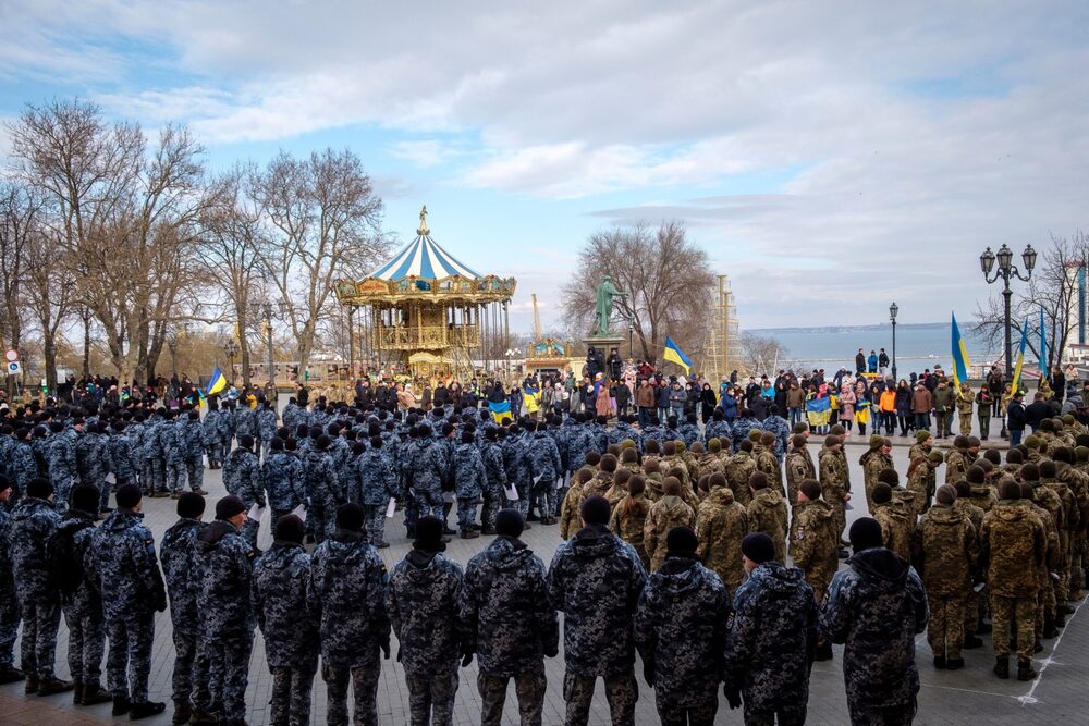 Police officers and Ukrainian soldiers attend a rally in Odessa. The port city on the northwestern shore of the Black Sea has over 1 million people and is a short hop by sea from Crimea. Police officers and Ukrainian soldiers attend a rally in Odessa. The port city on the northwestern shore of the Black Sea has over 1 million people and is a short hop by sea from Crimea.