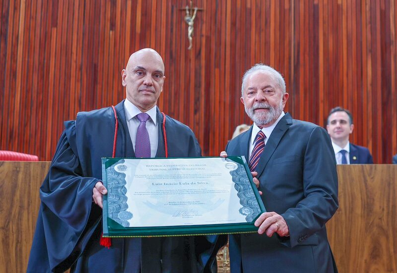 Lula (right) gets was certified as president-elect by Brazil's Electoral Court, headed by Justice Alexandre de Moraes (left). Lula (right) gets was certified as president-elect by Brazil's Electoral Court, headed by Justice Alexandre de Moraes (left).