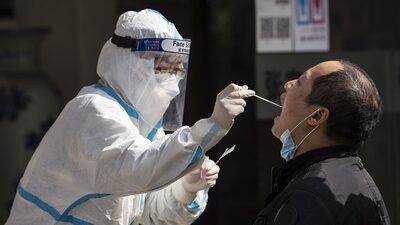 Traders chineses apostam que estímulo superará surto de covid Traders chineses apostam que estímulo superará surto de covid