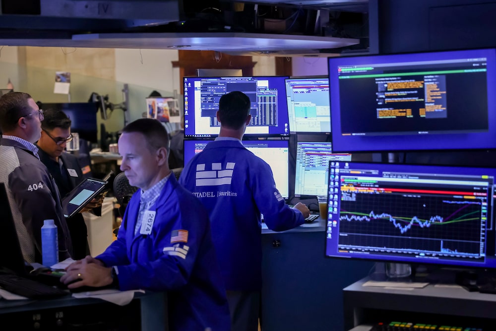 Traders work on the floor of the New York Stock Exchange (NYSE) in New York, US, on Wednesday, Aug. 19, 2026. Wall Street staged a rebound after the Treasury said it plans to boost buybacks of longer-dated bonds, a signal the US wants to lower borrowing costs after yields hit multi-decade highs. Photographer: Michael Nagle/Bloomberg Traders work on the floor of the New York Stock Exchange (NYSE) in New York, US, on Wednesday, Aug. 19, 2026. Wall Street staged a rebound after the Treasury said it plans to boost buybacks of longer-dated bonds, a signal the US wants to lower borrowing costs after yields hit multi-decade highs. Photographer: Michael Nagle/Bloomberg