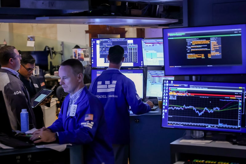 Traders work on the floor of the New York Stock Exchange (NYSE) in New York, US, on Wednesday, Aug. 19, 2026. Wall Street staged a rebound after the Treasury said it plans to boost buybacks of longer-dated bonds, a signal the US wants to lower borrowing costs after yields hit multi-decade highs. Photographer: Michael Nagle/Bloomberg Traders work on the floor of the New York Stock Exchange (NYSE) in New York, US, on Wednesday, Aug. 19, 2026. Wall Street staged a rebound after the Treasury said it plans to boost buybacks of longer-dated bonds, a signal the US wants to lower borrowing costs after yields hit multi-decade highs. Photographer: Michael Nagle/Bloomberg