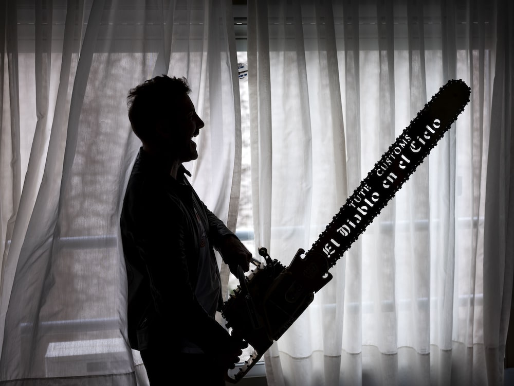 Mariano ‘Tute’ Di Tella holds one of his custom made chainsaws that reads in Spanish “The Devil in Heaven.” Photographer: Pablo E. Piovano/Bloomberg Mariano ‘Tute’ Di Tella holds one of his custom made chainsaws that reads in Spanish “The Devil in Heaven.” Photographer: Pablo E. Piovano/Bloomberg