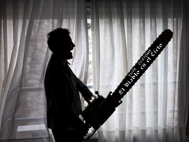 Mariano ‘Tute’ Di Tella holds one of his custom made chainsaws that reads in Spanish “The Devil in Heaven.” Photographer: Pablo E. Piovano/Bloomberg Mariano ‘Tute’ Di Tella holds one of his custom made chainsaws that reads in Spanish “The Devil in Heaven.” Photographer: Pablo E. Piovano/Bloomberg