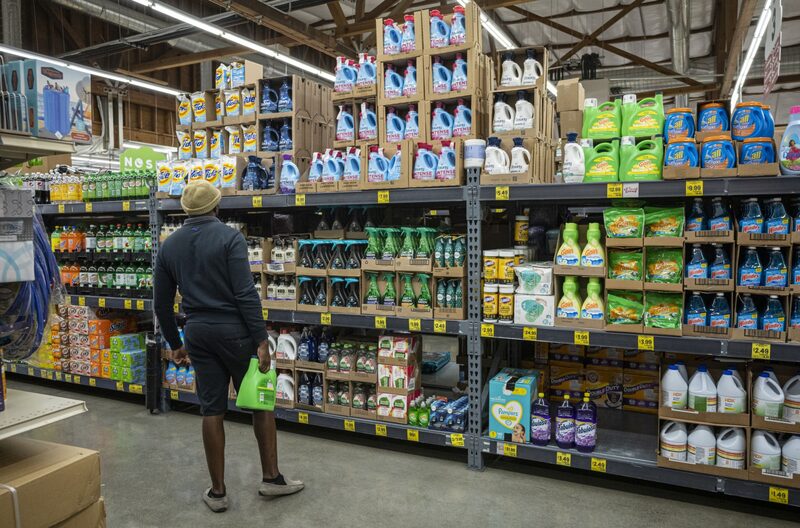A shopper inside a grocery store in San Francisco, California. A shopper inside a grocery store in San Francisco, California.