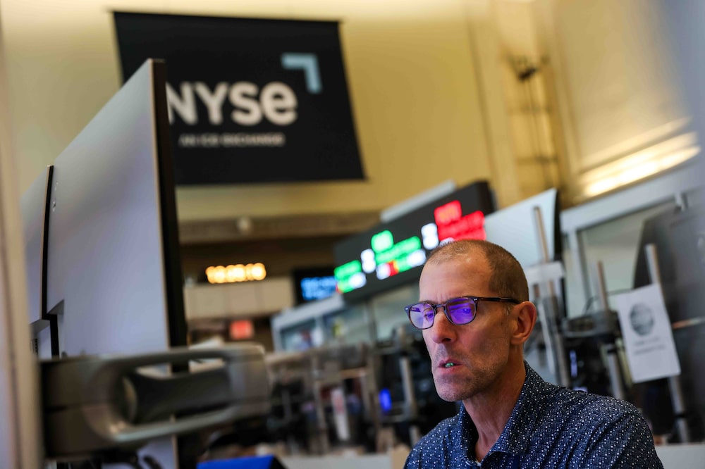 A trader works on the floor of the American Stock Exchange (AMEX) at the New York Stock Exchange (NYSE) in New York, US, on Monday, Aug. 24, 2026. Wall Street kicked off the week on a cautious note, with a rout in chipmakers outweighing an oil decline as traders parsed Treasury Secretary Scott Bessents plan to isolate Iran from the global economy. Photographer: Michael Nagle/Bloomberg A trader works on the floor of the American Stock Exchange (AMEX) at the New York Stock Exchange (NYSE) in New York, US, on Monday, Aug. 24, 2026. Wall Street kicked off the week on a cautious note, with a rout in chipmakers outweighing an oil decline as traders parsed Treasury Secretary Scott Bessents plan to isolate Iran from the global economy. Photographer: Michael Nagle/Bloomberg