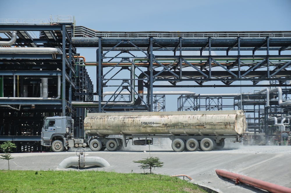 An oil tanker at the Dangote Petroleum Refinery and Petrochemicals FZE plant in Ibeju Lekki, Lagos, Nigeria, on Monday, Oct. 12, 2026. Dangote Petroleum Refinery and Petrochemicals FZE swung to a profit after Africas biggest oil-processing facility reached full capacity and as it undertakes the continents largest initial public offering to date. Photographer: Damilola Onafuwa/Bloomberg An oil tanker at the Dangote Petroleum Refinery and Petrochemicals FZE plant in Ibeju Lekki, Lagos, Nigeria, on Monday, Oct. 12, 2026. Dangote Petroleum Refinery and Petrochemicals FZE swung to a profit after Africas biggest oil-processing facility reached full capacity and as it undertakes the continents largest initial public offering to date. Photographer: Damilola Onafuwa/Bloomberg