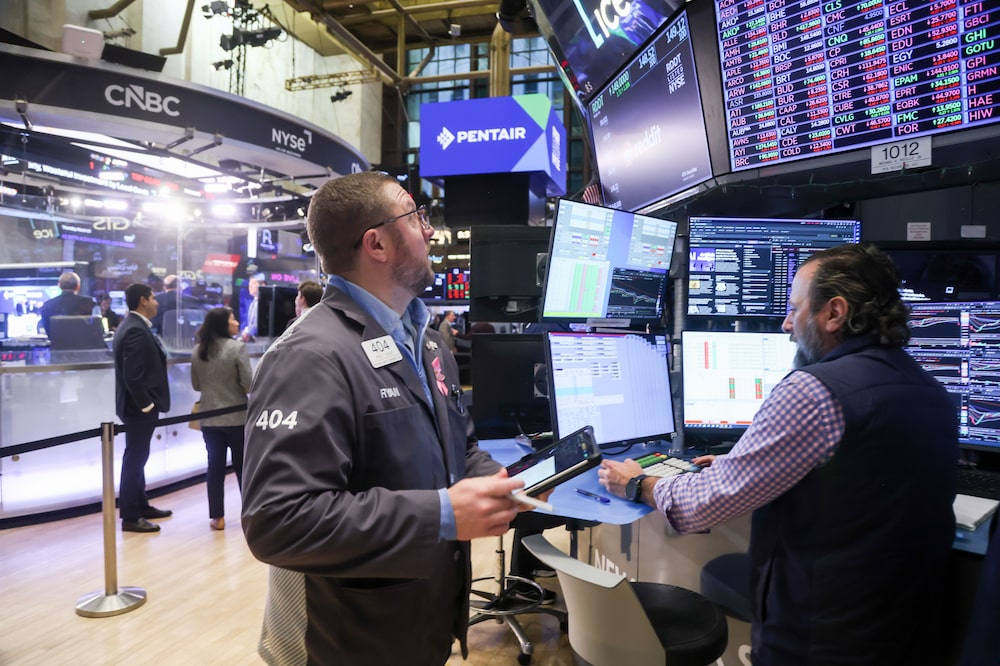 Traders work on the floor at the New York Stock Exchange (NYSE) in New York, US, on Thursday, March 5, 2026. A renewed spike in oil prices combined with data showing labor-market resilience lifted Treasury yields as stocks fell amid reduced odds of Federal Reserve interest-rate cuts. Photographer: Michael Nagle/Bloomberg Traders work on the floor at the New York Stock Exchange (NYSE) in New York, US, on Thursday, March 5, 2026. A renewed spike in oil prices combined with data showing labor-market resilience lifted Treasury yields as stocks fell amid reduced odds of Federal Reserve interest-rate cuts. Photographer: Michael Nagle/Bloomberg