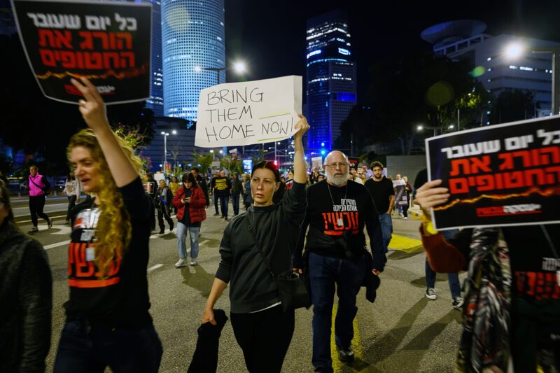 TEL AVIV, ISRAEL - DECEMBER 15: Protesters march through the streets after demonstrating outside the Israel Defense Force headquarters on December 15, 2023 in Tel Aviv, Israel. Earlier today, the IDF said its forces accidentally killed three hostages being held in Gaza when it mistakenly identified them as potential threats. Yotam Haim, Samer Talalka, Alon Shamriz were kidnapped from southern Israel on Oct. 7 by Hamas militants and taken back to the Gaza Strip. Israel launched an air and ground campaign in Gaza soon thereafter in an effort to defeat Hamas. In November, a weeklong ceasefire allowed for the negotiated release of some hostages, but more than 100 remain in captivity. (Photo by Alexi J. Rosenfeld/Getty Images) TEL AVIV, ISRAEL - DECEMBER 15: Protesters march through the streets after demonstrating outside the Israel Defense Force headquarters on December 15, 2023 in Tel Aviv, Israel. Earlier today, the IDF said its forces accidentally killed three hostages being held in Gaza when it mistakenly identified them as potential threats. Yotam Haim, Samer Talalka, Alon Shamriz were kidnapped from southern Israel on Oct. 7 by Hamas militants and taken back to the Gaza Strip. Israel launched an air and ground campaign in Gaza soon thereafter in an effort to defeat Hamas. In November, a weeklong ceasefire allowed for the negotiated release of some hostages, but more than 100 remain in captivity. (Photo by Alexi J. Rosenfeld/Getty Images)