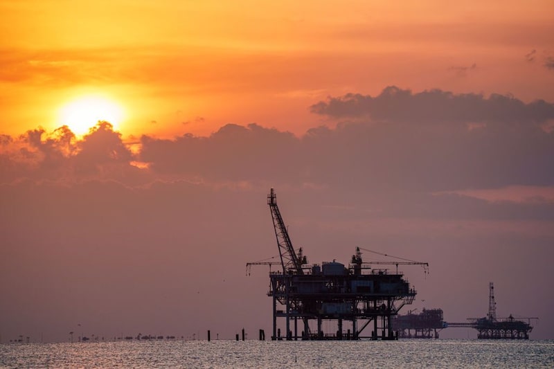 FORT MORGAN, AL - MAY 10: Offshore gas rigs are silhouetted against the setting sun on May 10, 2024, near Fort Morgan, AL. (Photo by J. David Ake/Getty Images) Photographer: J. David Ake/Getty Images North America FORT MORGAN, AL - MAY 10: Offshore gas rigs are silhouetted against the setting sun on May 10, 2024, near Fort Morgan, AL. (Photo by J. David Ake/Getty Images) Photographer: J. David Ake/Getty Images North America