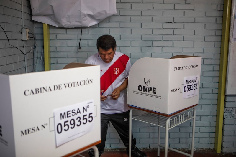 A voter casts a ballot at a polling station during the runoff election in Lima, Peru, on Sunday, June 7, 2026. Peruvians are heading to the polls on Sunday in what is expected to be a tight presidential runoff, with the model behind one of Latin America's most stable economies at stake. Photographer: Marco Garro/Bloomberg A voter casts a ballot at a polling station during the runoff election in Lima, Peru, on Sunday, June 7, 2026. Peruvians are heading to the polls on Sunday in what is expected to be a tight presidential runoff, with the model behind one of Latin America's most stable economies at stake. Photographer: Marco Garro/Bloomberg