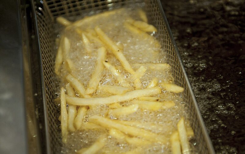 French fries are cooked during a quality evaluation at McDonald's Corp. headquarters in Oak Brook, Illinois, U.S. French fries are cooked during a quality evaluation at McDonald's Corp. headquarters in Oak Brook, Illinois, U.S.