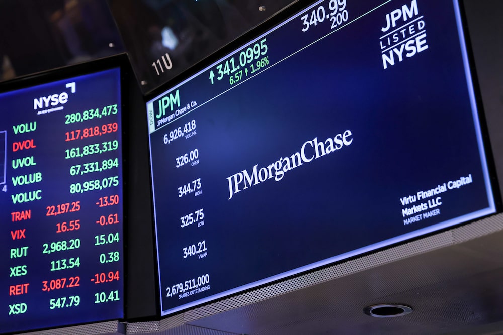 JPMorgan Chase & Co. signage on the floor of the New York Stock Exchange (NYSE) in New York, US, on Tuesday, July 14, 2026. A cooler-than-estimated inflation reading spurred gains in both stocks and bonds, easing concern about imminent Federal Reserve interest-rate hikes amid a resurgence in oil prices. Photographer: Michael Nagle/Bloomberg JPMorgan Chase & Co. signage on the floor of the New York Stock Exchange (NYSE) in New York, US, on Tuesday, July 14, 2026. A cooler-than-estimated inflation reading spurred gains in both stocks and bonds, easing concern about imminent Federal Reserve interest-rate hikes amid a resurgence in oil prices. Photographer: Michael Nagle/Bloomberg