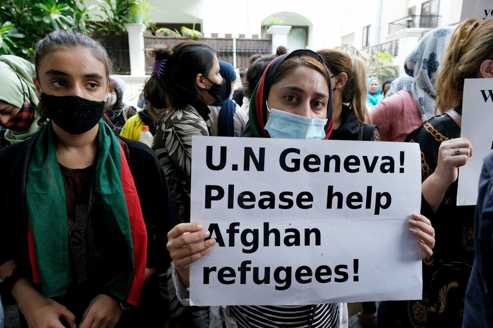 Demonstrators protest against Taliban rule in Afghanistan and the treatment of Afghan asylum seekers in India outside the office of the United Nations High Commission for Refugees in New Delhi, India, on Monday, Aug. 23, 2021. The chaos in Afghanistan and around the Kabul airport is fueling widespread criticism of U.S President Joe Biden's handling of the withdrawal of thousands of Americans and of Afghans who helped U.S. forces over the past two decades and now face the risk of Taliban reprisals. Demonstrators protest against Taliban rule in Afghanistan and the treatment of Afghan asylum seekers in India outside the office of the United Nations High Commission for Refugees in New Delhi, India, on Monday, Aug. 23, 2021. The chaos in Afghanistan and around the Kabul airport is fueling widespread criticism of U.S President Joe Biden's handling of the withdrawal of thousands of Americans and of Afghans who helped U.S. forces over the past two decades and now face the risk of Taliban reprisals.