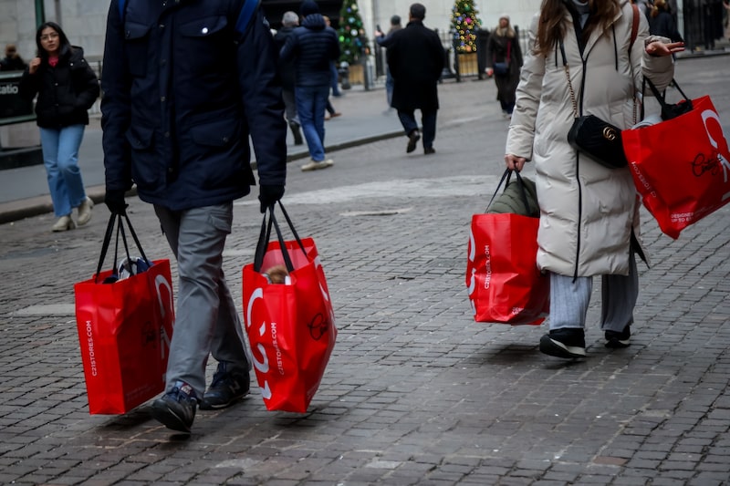Foto de referencia. Compradores cerca de la Bolsa de Valores de Nueva York. Fotógrafo: Michael Nagle/Bloomberg. Foto de referencia. Compradores cerca de la Bolsa de Valores de Nueva York. Fotógrafo: Michael Nagle/Bloomberg.