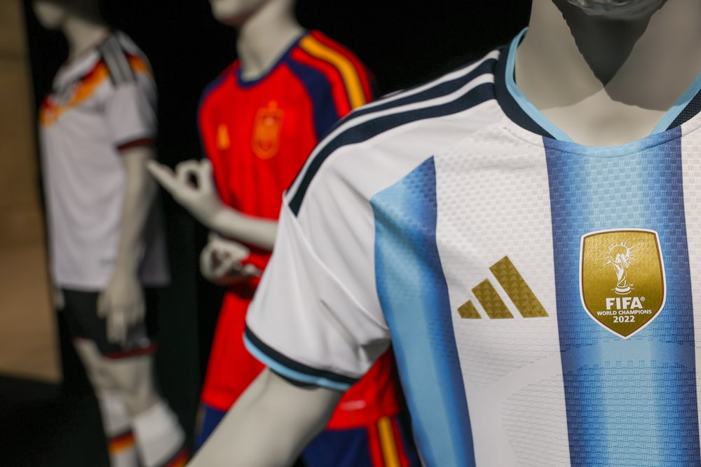 A display of Adidas AG football jerseys of national teams at their headquarters in Herzogenaurach, Germany, on Wednesday, March 4, 2026. Adidas forecast higher profits this year and market share gains through 2028 as the German brand looks to maintain its momentum with retro sneakers and new running and football products. Photographer: Alex Kraus/Bloomberg A display of Adidas AG football jerseys of national teams at their headquarters in Herzogenaurach, Germany, on Wednesday, March 4, 2026. Adidas forecast higher profits this year and market share gains through 2028 as the German brand looks to maintain its momentum with retro sneakers and new running and football products. Photographer: Alex Kraus/Bloomberg