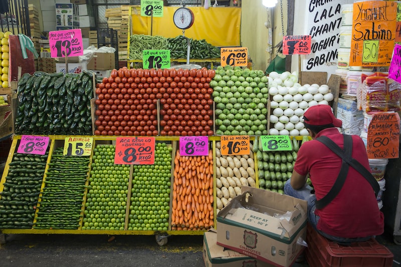A vendor arranges chayotes for sale at the Central de Abasto market in Mexico City, Mexico, on Thursday, May 22, 2014. Mexico's central bank lowered its 2014 growth forecast last week after consumer confidence plunged to its lowest level in almost four years in January, when new taxes took effect. Photographer: Susana Gonzalez/Bloomberg A vendor arranges chayotes for sale at the Central de Abasto market in Mexico City, Mexico, on Thursday, May 22, 2014. Mexico's central bank lowered its 2014 growth forecast last week after consumer confidence plunged to its lowest level in almost four years in January, when new taxes took effect. Photographer: Susana Gonzalez/Bloomberg