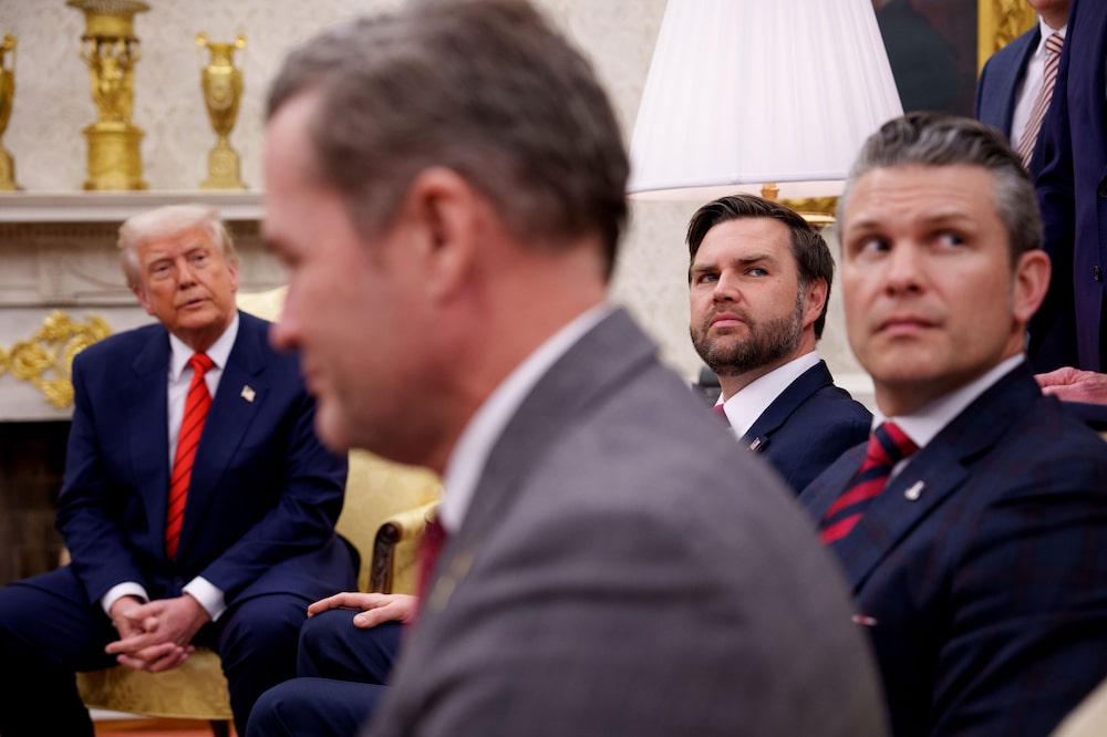 WASHINGTON, DC - MARCH 13: (L-R) U.S. President Donald Trump, U.S. National Security Adviser Michael Waltz, U.S. Vice President J.D. Vance, and Defense Secretary Pete Hegseth, listen to a question from a reporter during a meeting in the Oval Office of the White House on March 13, 2025 in Washington, DC. The two leaders met as the Trump administration has once again put the military alliance between the United States and Western Europe in question. (Photo by Andrew Harnik/Getty Images) WASHINGTON, DC - MARCH 13: (L-R) U.S. President Donald Trump, U.S. National Security Adviser Michael Waltz, U.S. Vice President J.D. Vance, and Defense Secretary Pete Hegseth, listen to a question from a reporter during a meeting in the Oval Office of the White House on March 13, 2025 in Washington, DC. The two leaders met as the Trump administration has once again put the military alliance between the United States and Western Europe in question. (Photo by Andrew Harnik/Getty Images)