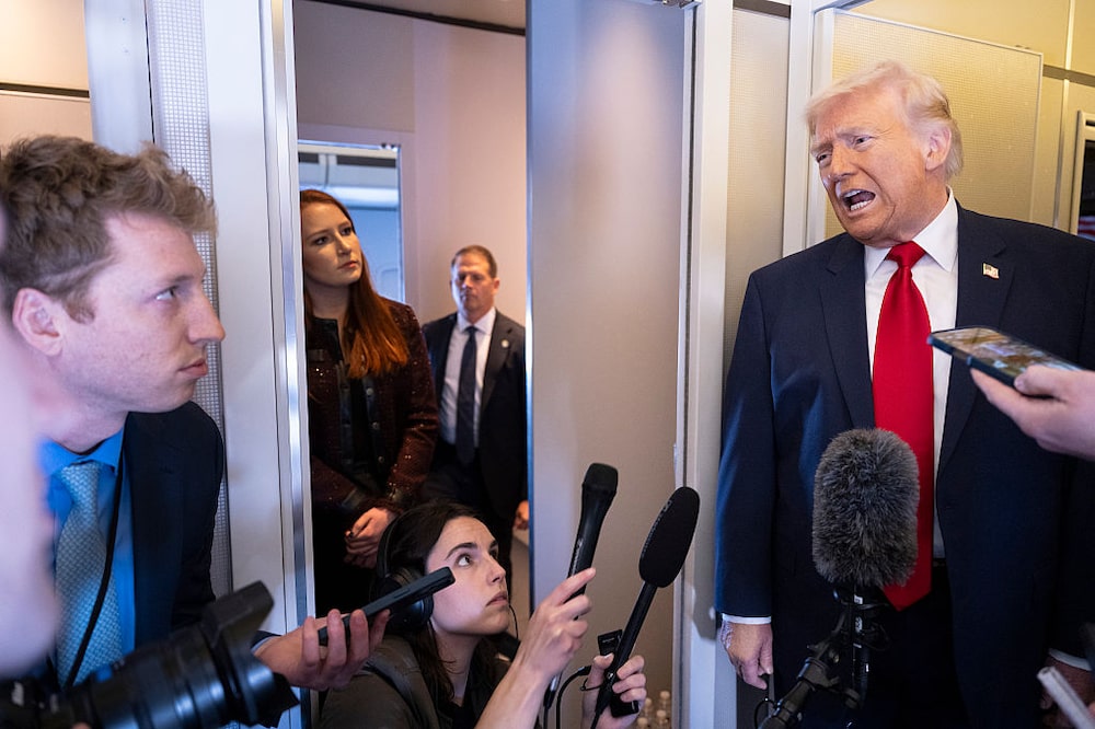 IN FLIGHT- MARCH 7:U.S. President Donald Trump speaks to members of the media traveling on Air Force One while heading to Miami on March 7, 2026. President Trump and other members of the government attended the dignified transfer of six soldiers from the 103rd Sustainment Command who were killed in action by an Iranian drone strike on March 1 in Port of Shuaiba, Kuwait during "Operation Epic Fury". (Photo by Roberto Schmidt/Getty Images) IN FLIGHT- MARCH 7:U.S. President Donald Trump speaks to members of the media traveling on Air Force One while heading to Miami on March 7, 2026. President Trump and other members of the government attended the dignified transfer of six soldiers from the 103rd Sustainment Command who were killed in action by an Iranian drone strike on March 1 in Port of Shuaiba, Kuwait during "Operation Epic Fury". (Photo by Roberto Schmidt/Getty Images)