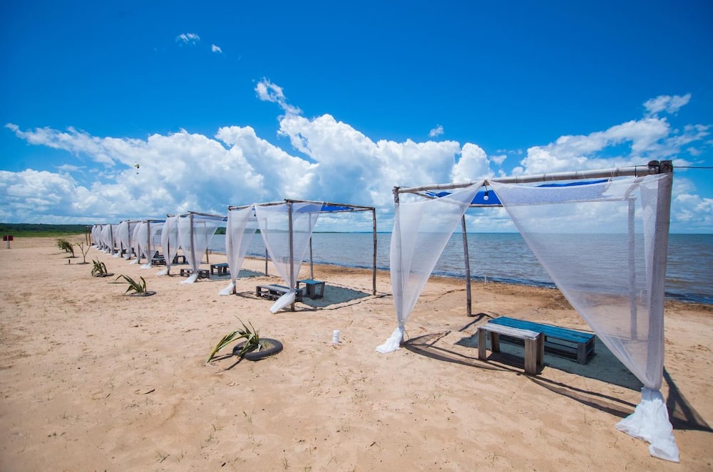 Playa en Carmen del Paraná, un distrito paraguayo del departamento de Itapúa, ubicado en la región sur del país. Playa en Carmen del Paraná, un distrito paraguayo del departamento de Itapúa, ubicado en la región sur del país.