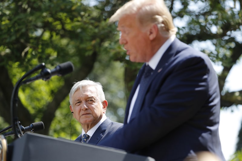 Andres Manuel Lopez Obrador, Mexico's president, listens as U.S. President Donald Trump, right, speaks during a signing ceremony in the Rose Garden of the White House in Washington, D.C., U.S., on Wednesday, July 8, 2020. Lopez Obrador has carefully built a rapport with Trump, even as the president lambasted Mexico for its drug cartels and crime rates, for migration flows into the U.S. and for allegedly taking advantage of America on trade. Photographer: Al Drago/Bloomberg Andres Manuel Lopez Obrador, Mexico's president, listens as U.S. President Donald Trump, right, speaks during a signing ceremony in the Rose Garden of the White House in Washington, D.C., U.S., on Wednesday, July 8, 2020. Lopez Obrador has carefully built a rapport with Trump, even as the president lambasted Mexico for its drug cartels and crime rates, for migration flows into the U.S. and for allegedly taking advantage of America on trade. Photographer: Al Drago/Bloomberg