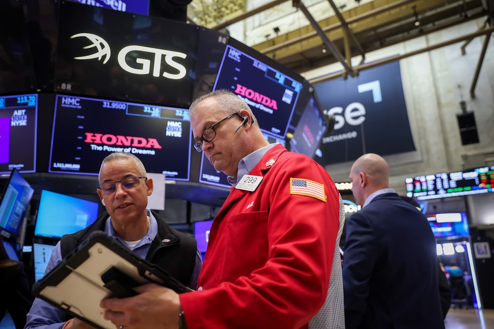Traders work on the floor of the New York Stock Exchange (NYSE) in New York, US, on Wednesday, Aug. 19, 2026. Wall Street staged a rebound after the Treasury said it plans to boost buybacks of longer-dated bonds, a signal the US wants to lower borrowing costs after yields hit multi-decade highs. Photographer: Michael Nagle/Bloomberg Traders work on the floor of the New York Stock Exchange (NYSE) in New York, US, on Wednesday, Aug. 19, 2026. Wall Street staged a rebound after the Treasury said it plans to boost buybacks of longer-dated bonds, a signal the US wants to lower borrowing costs after yields hit multi-decade highs. Photographer: Michael Nagle/Bloomberg