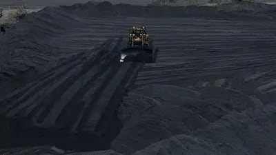 Una topadora mueve carbón en la mina de Cerrejón en Barrancas, La Guajira, Colombia, el jueves 8 de agosto de 2019. Fotógrafo: Nicolo Filippo Rosso/Bloomberg