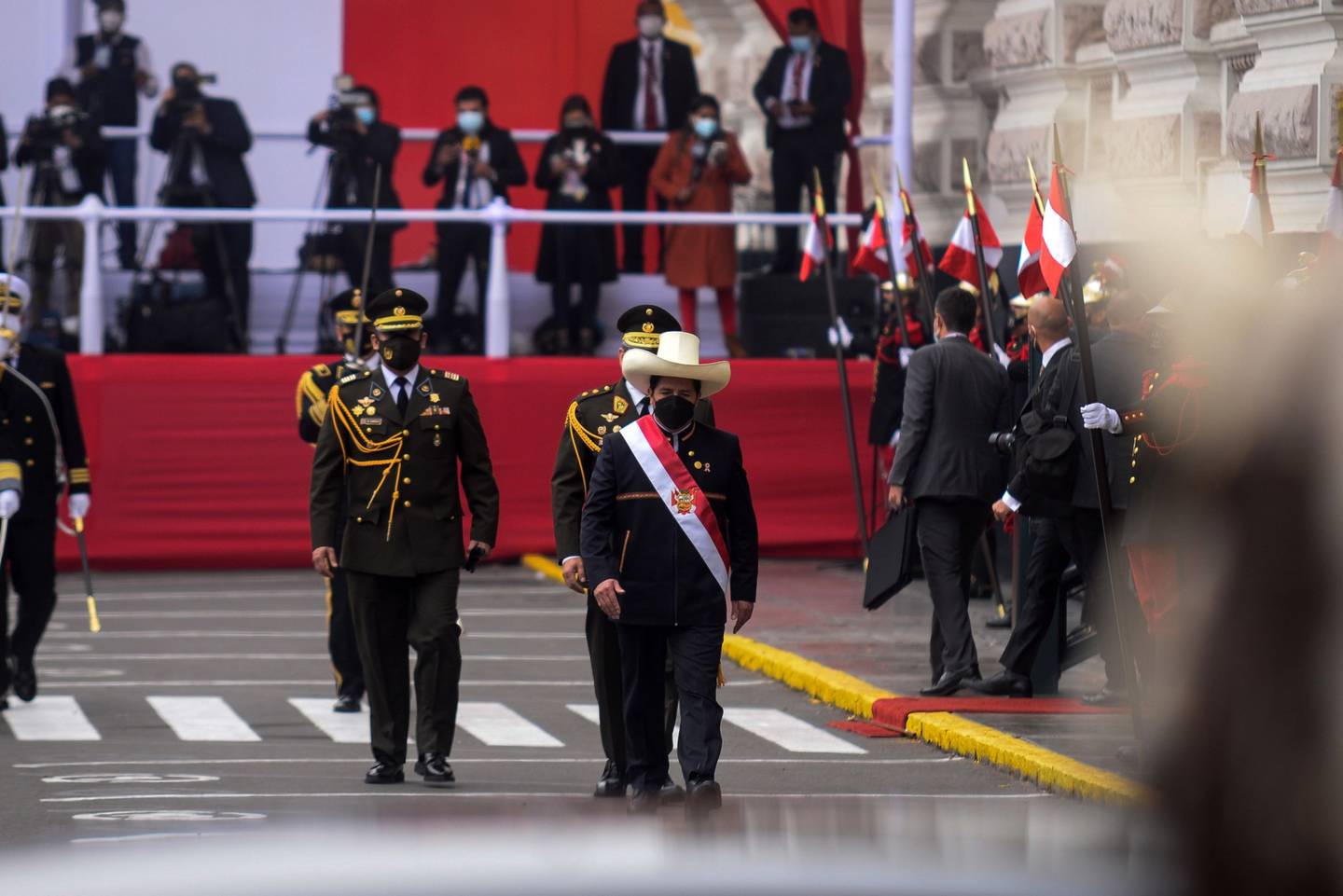 Pedro Castillo, Peru's president, departs from an inauguration ceremony at the Congress of the Republic of Peru in Lima, Peru, on Wednesday, July 28, 2021. Peru's dollar bonds due 2050 dropped after President Pedro Castillo said he would call for a constitutional referendum during his inaugural speech. Photographer: Miguel Yovera/Bloombergdfd