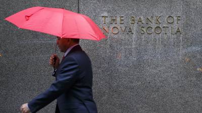 Scotiabank Cuts Jobs in Asia to Concentrate on North and South Americadfd
