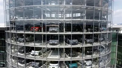 Volkswagen ID.3 electric cars inside a delivery tower at the automaker's factory in Dresden, Germany.