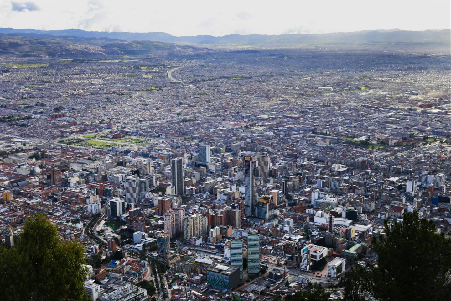 City buildings are seen from Cerro de Monserrate in Bogota, Colombia, on Tuesday, June 16, 2015. Colombia's fiscal deficit will widen next year to the most since 2010 amid lower crude prices, according to the government's latest financial plan. Photographer: Cassi Alexandra/Bloomberg