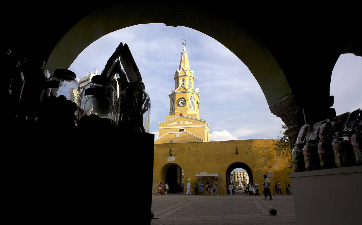 A clock tower stands in Cartagena, Colombia, on Wednesday, Nov. 9, 2011. Cartagena, the fifth-largest city in Colombia, is a center of economic activity in the Caribbean as well a popular tourist destination. Photographer: Paul Smith/Bloomberg