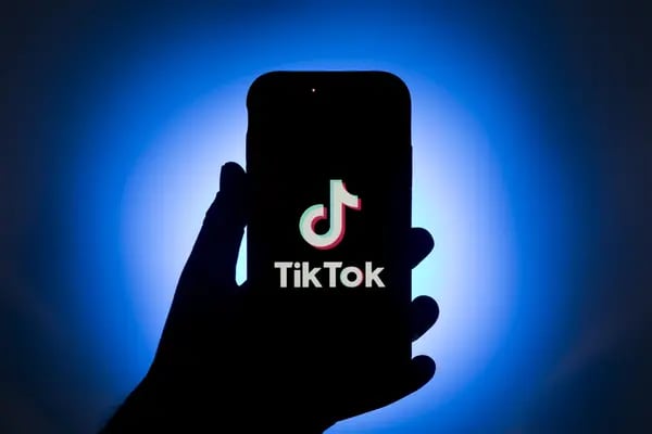 The logo for ByteDance Ltd.'s TikTok app is displayed on a smartphone in an arranged photograph in Sydney, New South Wales, Australia, on Monday Sept.14, 2020. *** SECOND SENTENCE HERE ***. Photographer: Brent Lewin/Bloomberg