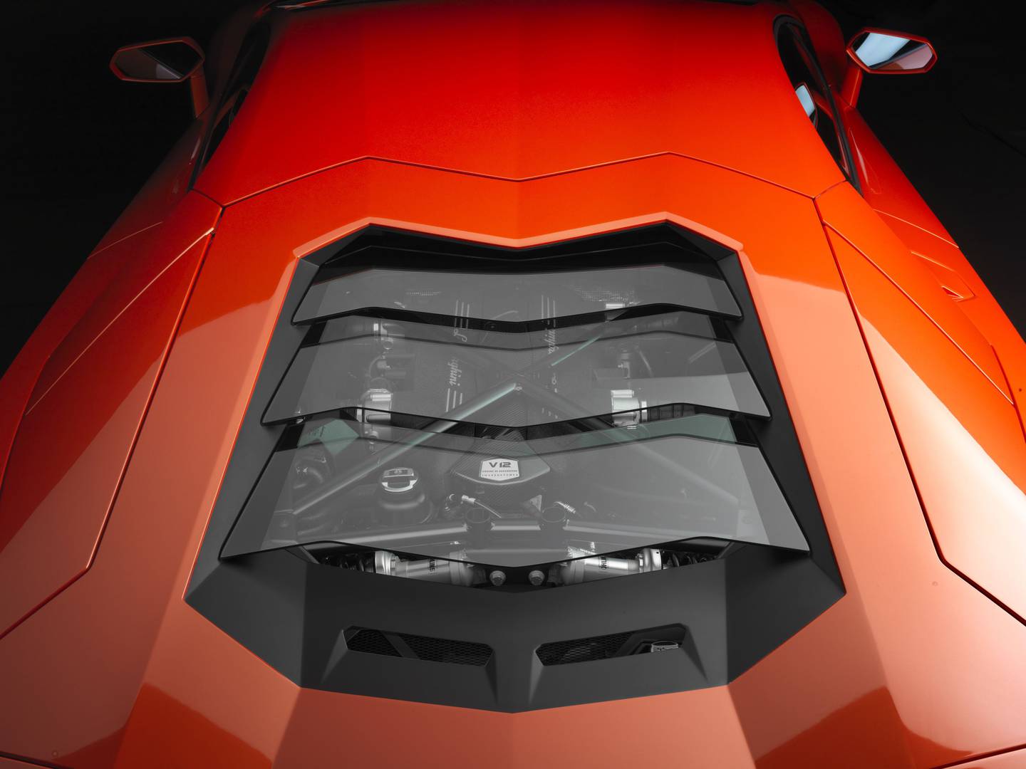 The 2012 Lamborghini Aventador LP700-4 has a V-12 engine with 691 horsepower, and rockets to 60 mph in 2.8 seconds.dfd
